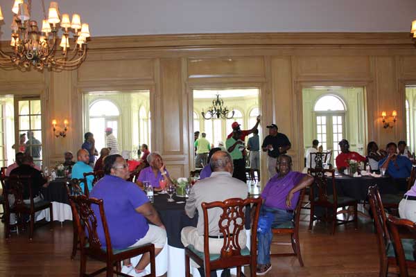 Group of golfers at an annual golf tournament
